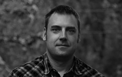 tom-our-team-pic Portrait of Tom Hock, Designer.