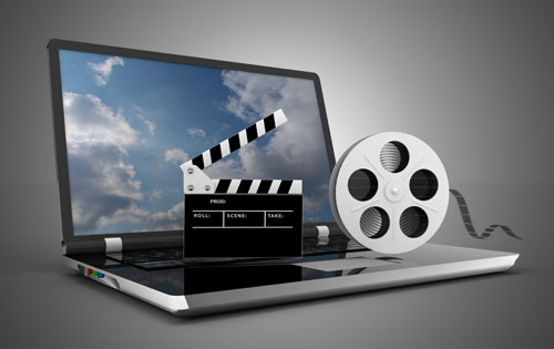 Stock-Hompage-Slider-Video Render of laptop, film roll, and director's action sign