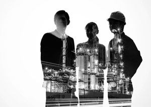 Double Exposure image of 3 people in suits with a construction site in their silhouette