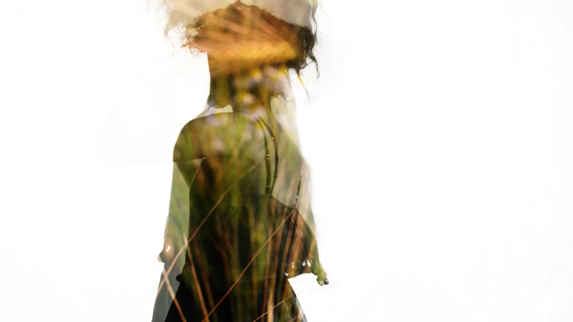 Double exposure image of a woman dancing with nature